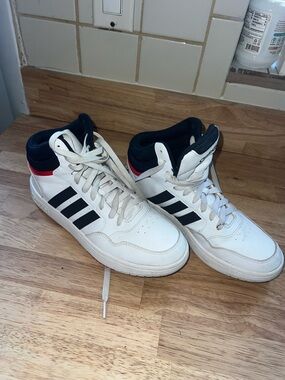 adidas Men’s White High-Top Sneakers with Black Stripes and Red Heel Accent